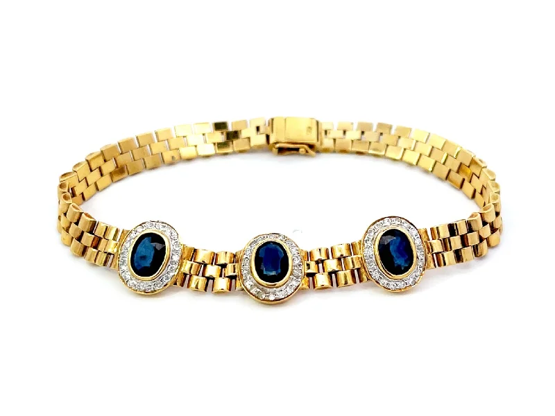 ladies-silver-flower-bracelets-Three Sapphire Diamond Halo Link Bracelet in 18k Yellow Gold