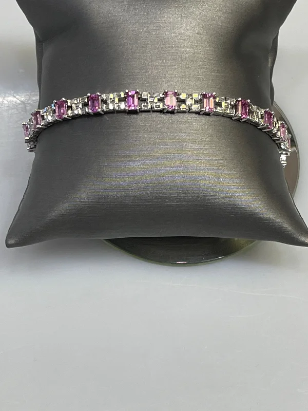 ladies-rustic-diamond-bracelets-18 Karat White Gold Diamond And Pink Sapphire Bracelet Gorgeous Baguette Diamonds & Emerald Cut Sapphire Bracelet