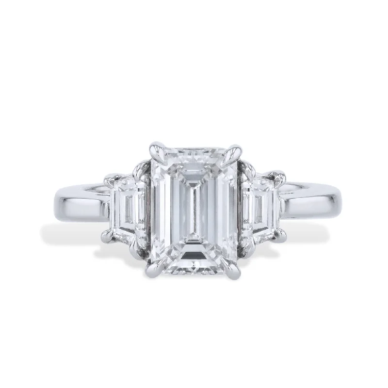 Ladies engagement rings with olive diamonds -Platinum Emerald Cut Diamond with Trapazoids Side Stones Engagement Ring