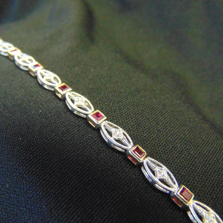 ladies-silver-moon-bracelets-14KT White And Yellow Gold Ruby & Diamond Bracelet