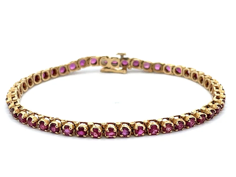 ladies-modern-gold-bracelets-Round Red Ruby Tennis Bracelet in 14k Yellow Gold