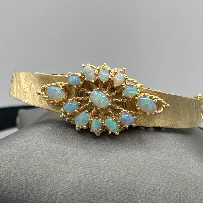 ladies-gemstone-charm-bracelets-14 Karat Yellow Gold Heavy Filigree Opal Bracelet With Swiss Watch Insert