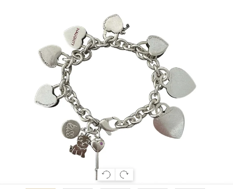 ladies-trendy-pearl-bracelets-Tiffany and Co. 7 Heart Charm Bracelet Sterling Silver