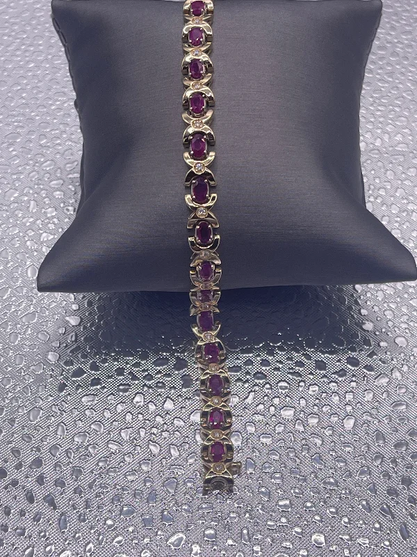 ladies-birthstone-bangle-bracelets-Ladies 14 Karat Gold X&O Ruby and Diamond Bracelet