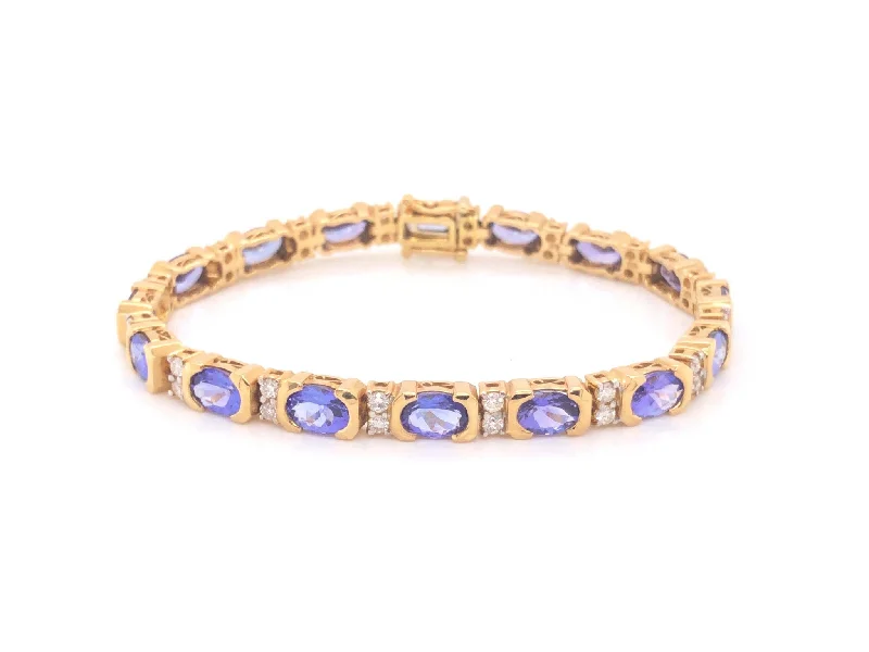 ladies-star-bangle-bracelets-11 Carat Tanzanite and Diamond Link Bracelet 18k Yellow Gold