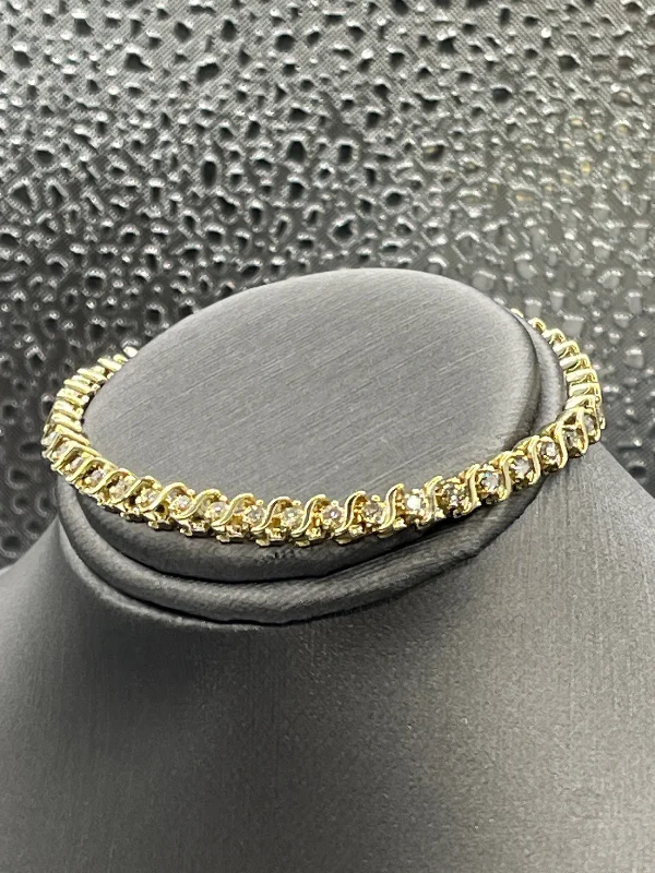 ladies-infinity-gold-bracelets-Ladies 14 Karat Solid Yellow Gold Diamond Tennis Bracelet